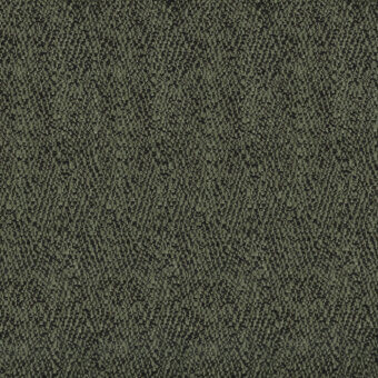 Olive-green textured fabric with charcoal accents, displaying a dense, irregular nubby weave and non-directional knotted pattern; label reads “turri 758 f”.